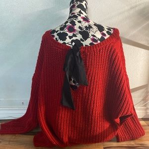 Red sweater with tie in back